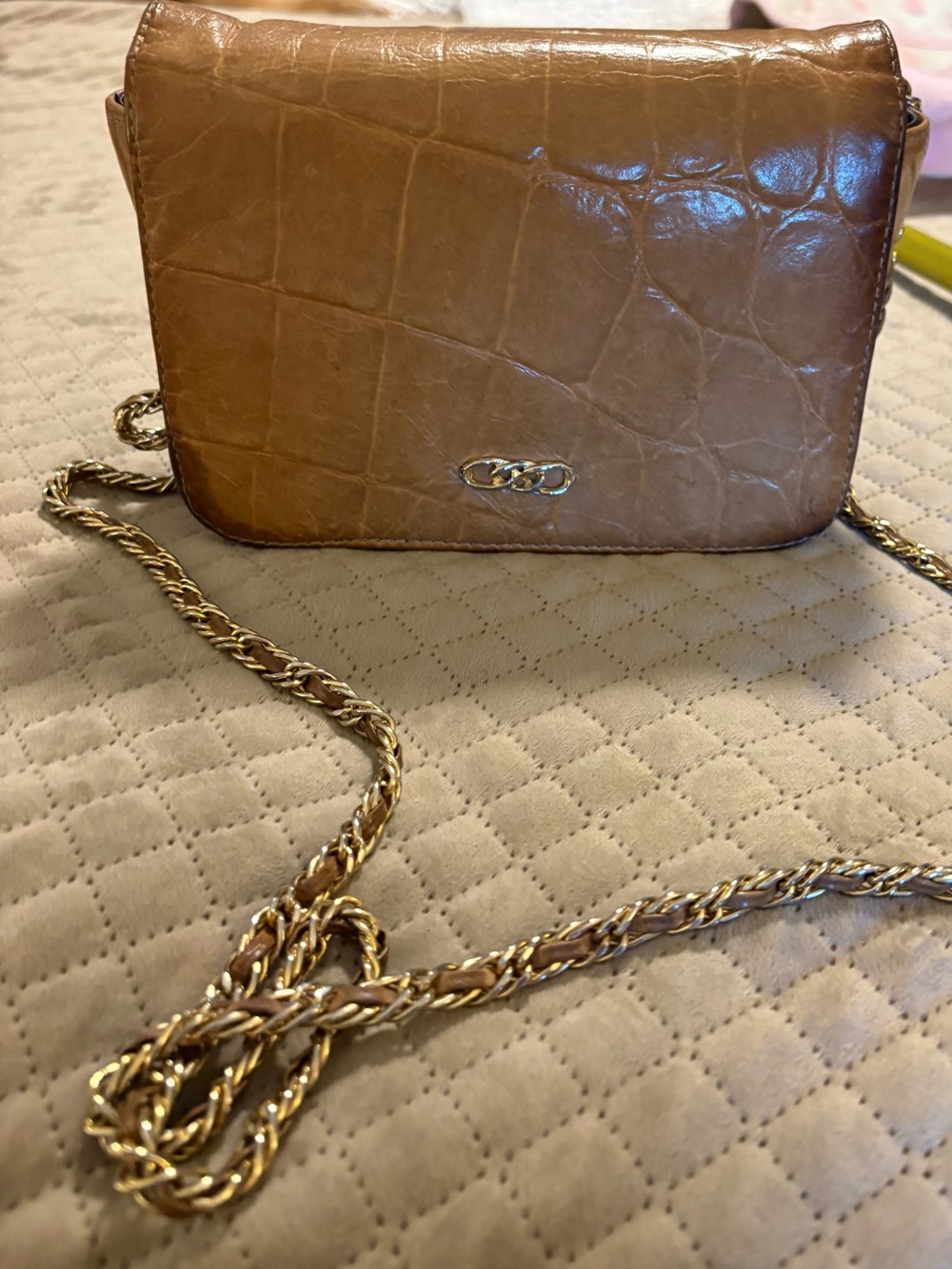 Vintage light brown leather embossed purse.